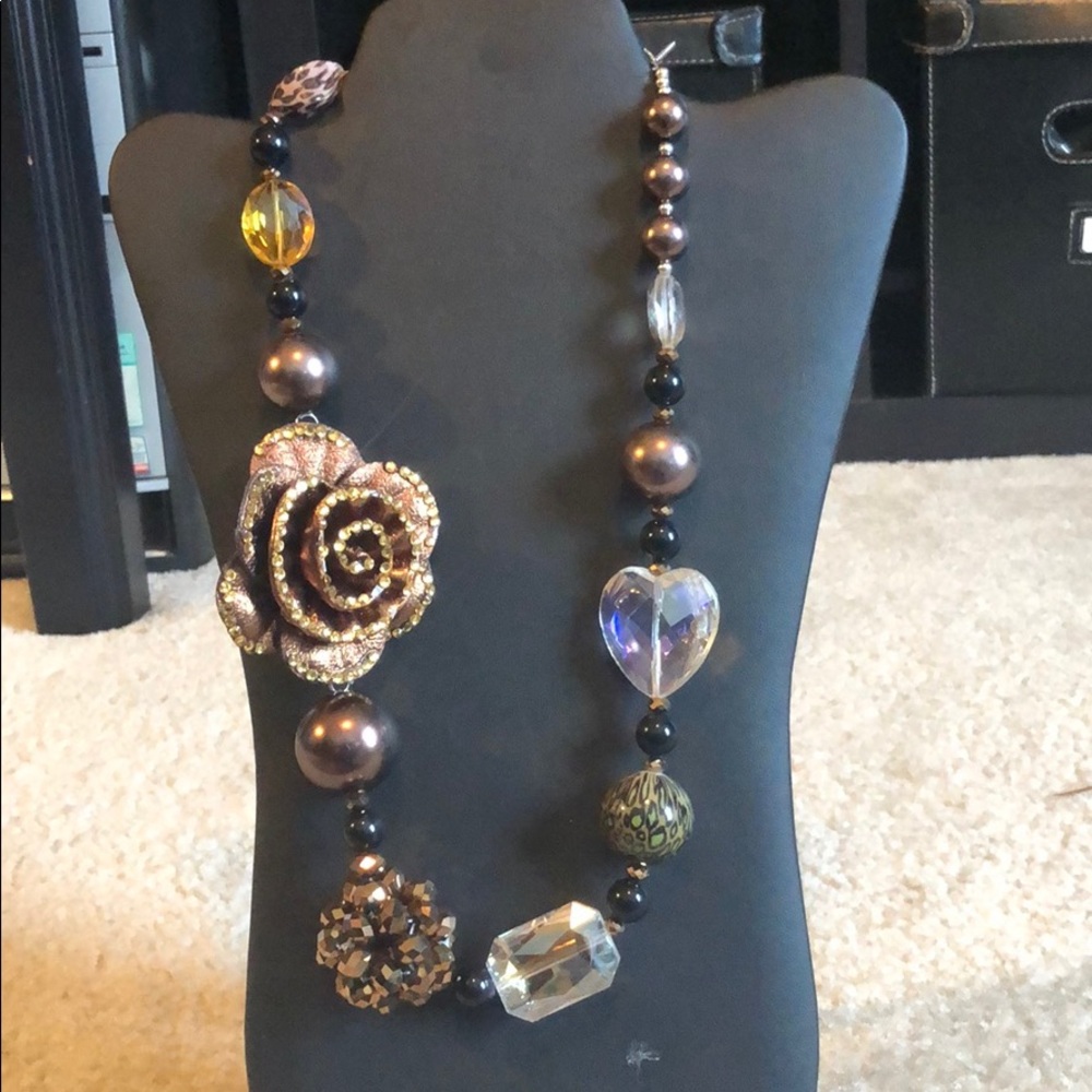 Large stones and beaded necklace.